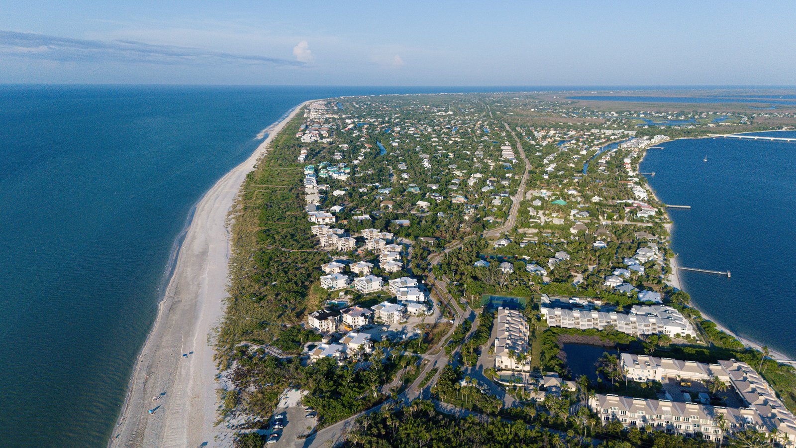 A coastal residential neighborhood seen from above.