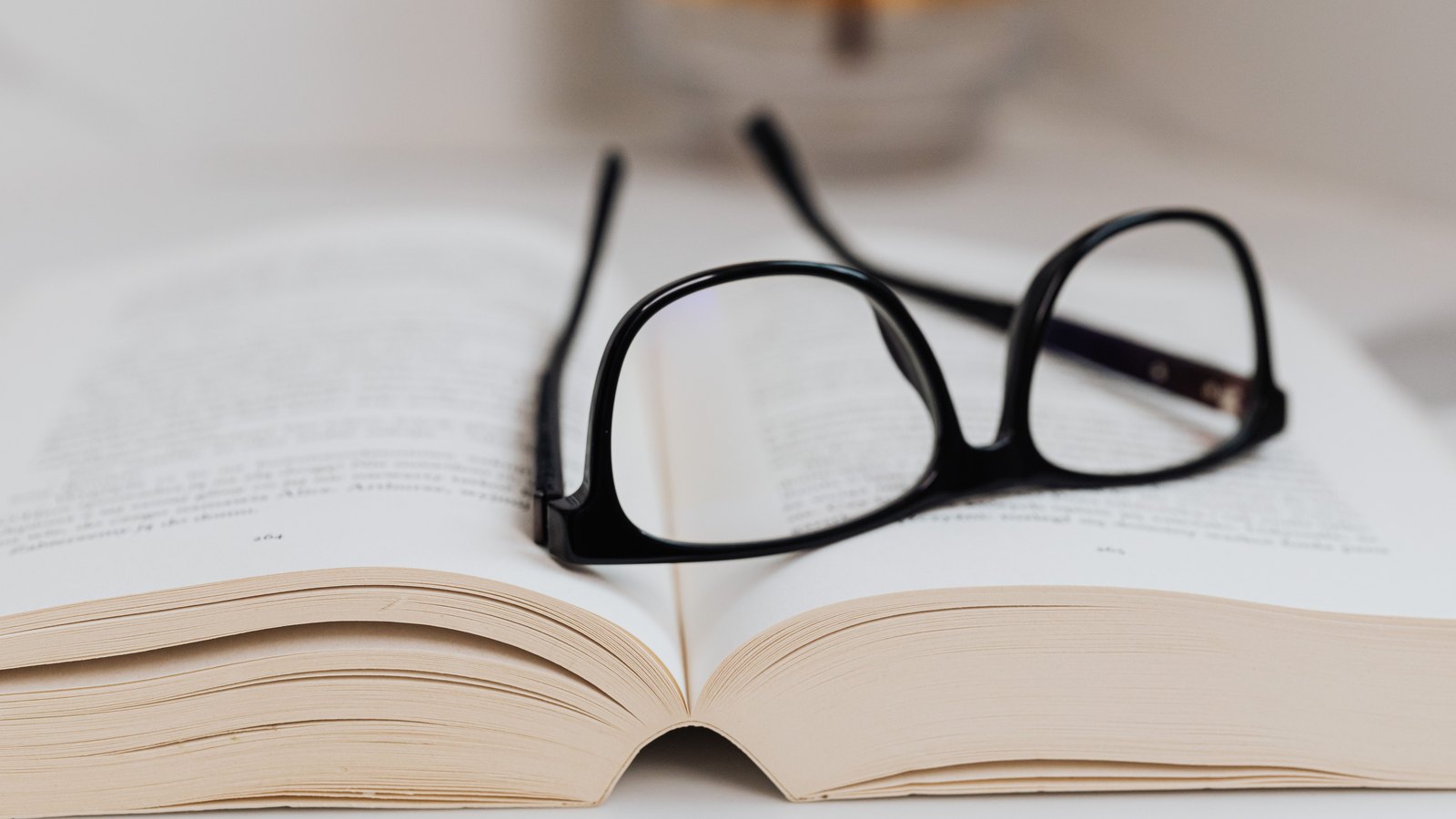 Black eyeglasses rest on an open legal reference book. This is a representative image, not a photograph of the case.