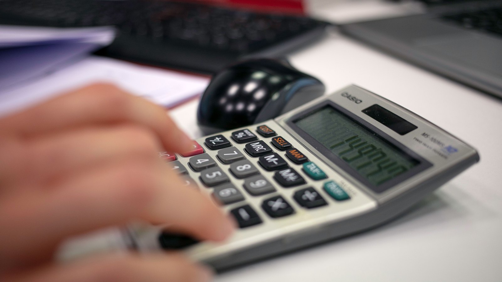 A calculator on a financial statement.