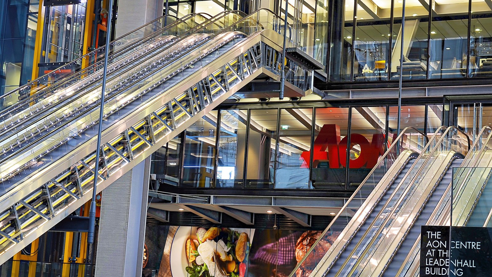 Escalators cross the atrium of the Aon Centre at the Leadenhall Building in London.
