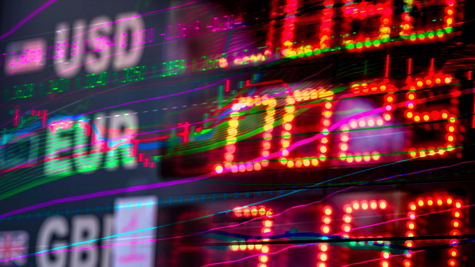 A photograph illustrating stock ticker board.
