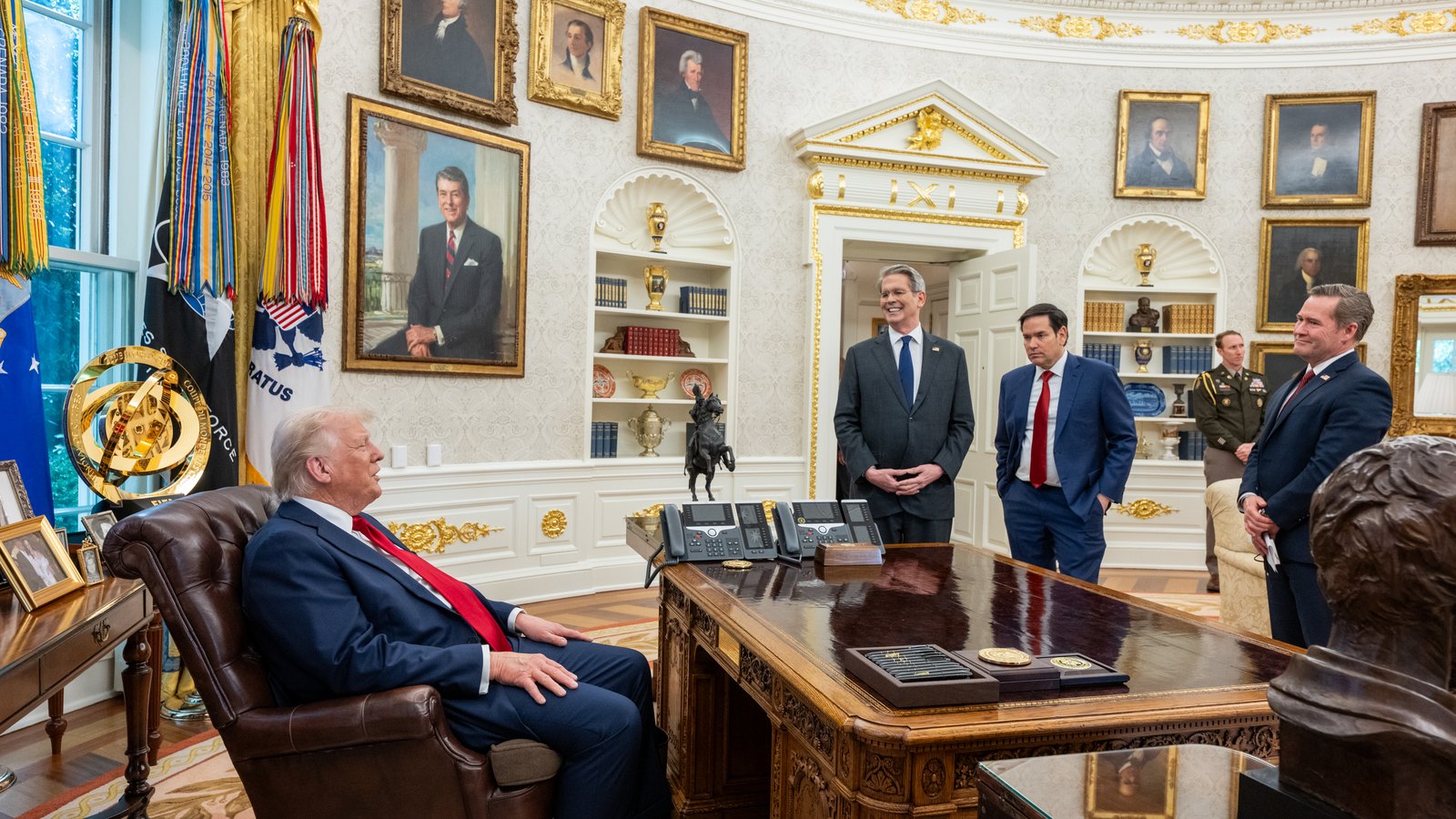 President Donald Trump meets with Treasury Secretary Scott Bessent, Secretary of State Marco Rubio, and National Security Advisor Mike Waltz in the Oval Office.