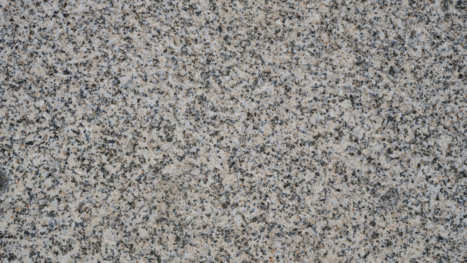 A photograph illustrating polished granite surface macro.