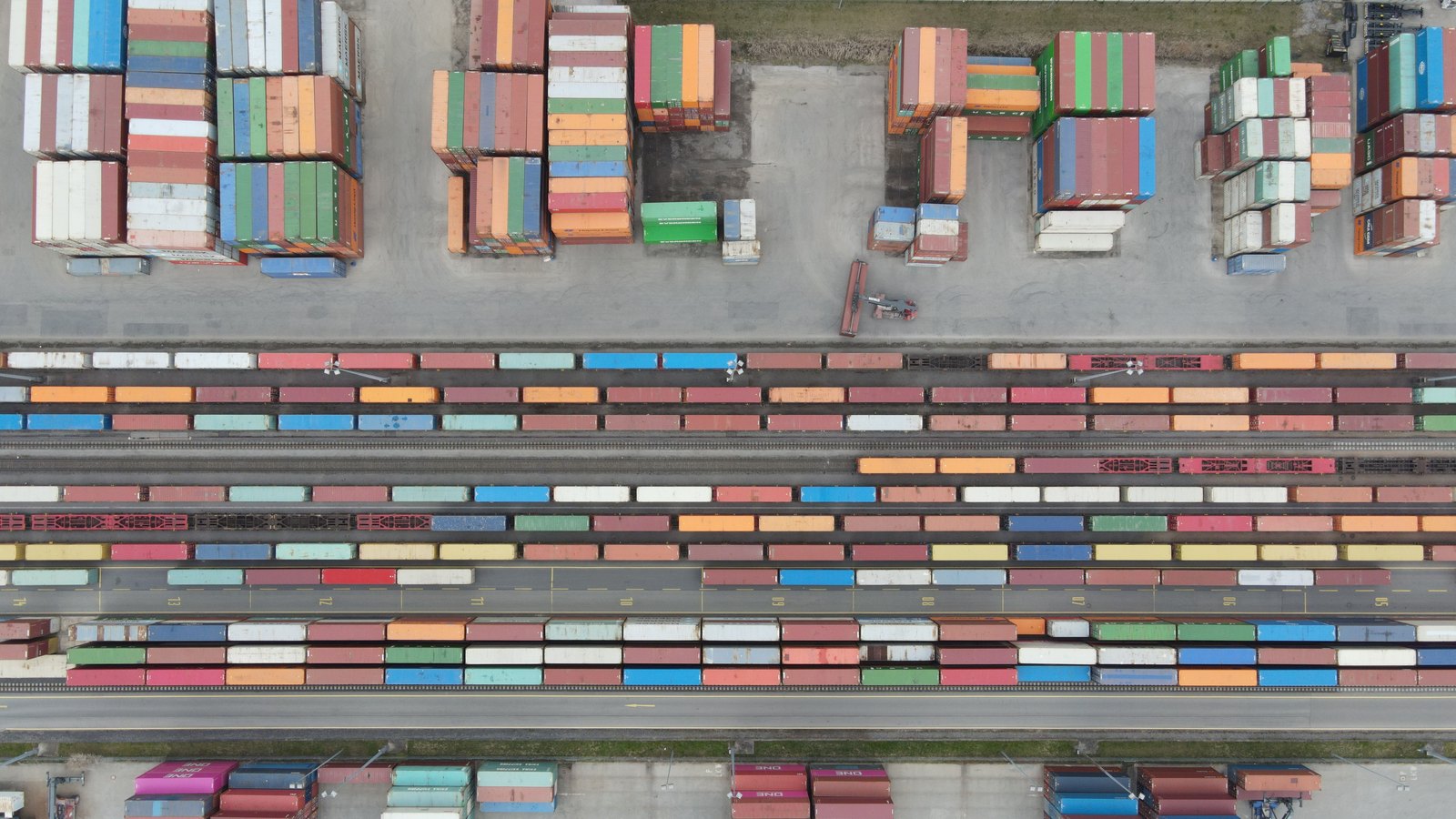 A photograph illustrating container yard aerial.