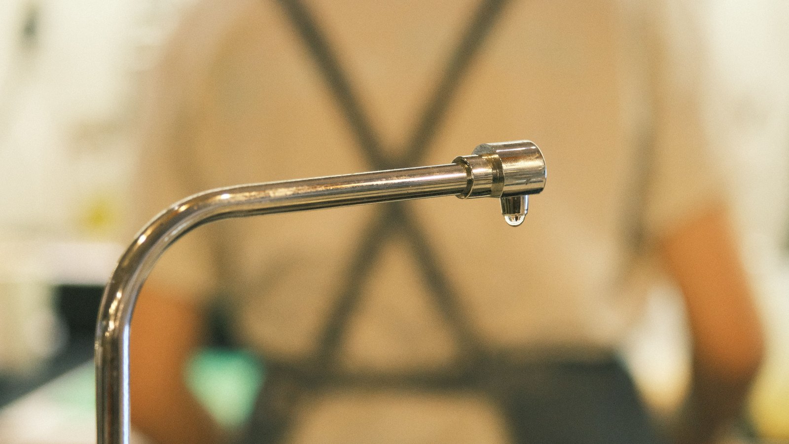 A water drop hangs from a metal faucet, not a photograph of these advisories.