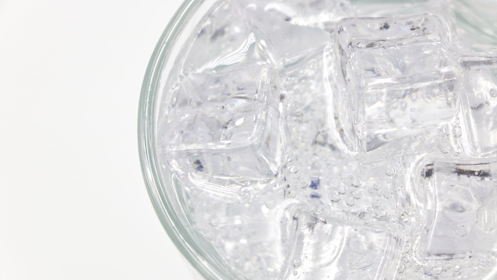 An overhead close-up of ice cubes in a clear glass of water, not a photograph of this advisory.