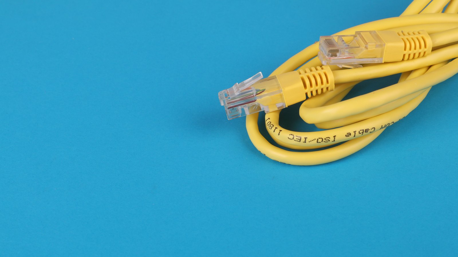 A photograph illustrating ethernet network cable plug.