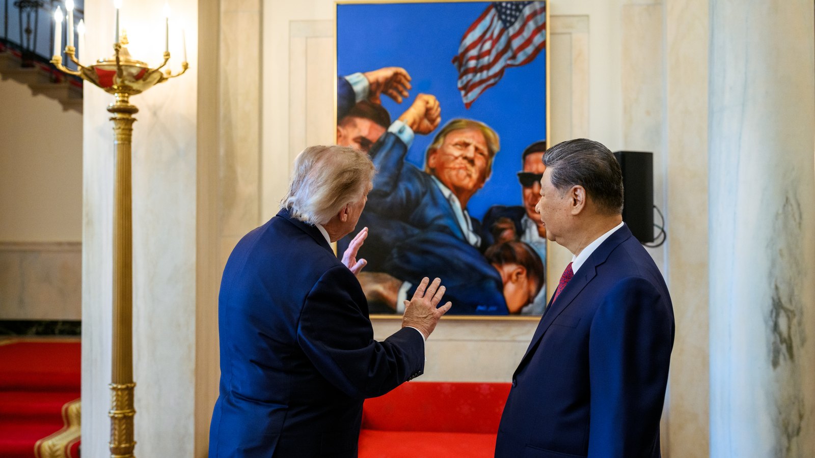President Donald Trump, seen from behind, speaks with President Xi Jinping inside the White House during the Chinese state visit.
