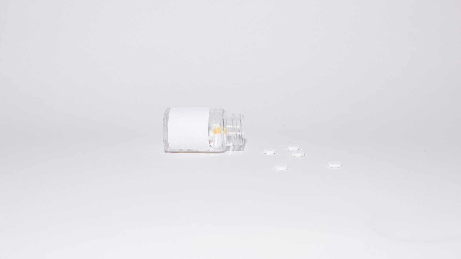 A photograph illustrating white tablets macro.
