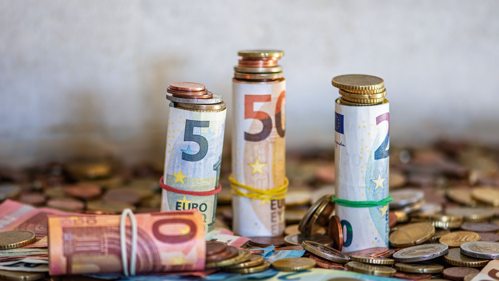 A photograph illustrating euro coins stacked macro.