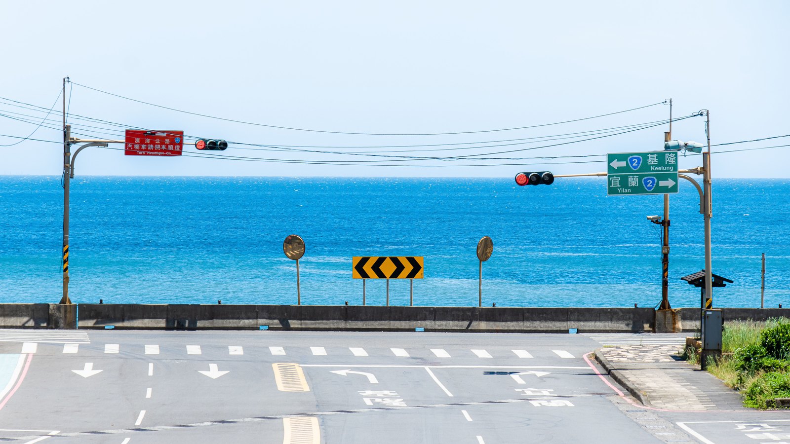 A road closure with barricades and signs.