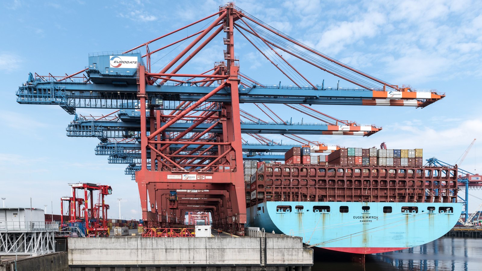 A container ship at a crane.