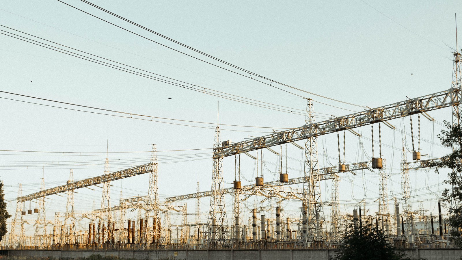 Electrical transmission equipment at an outdoor power substation.