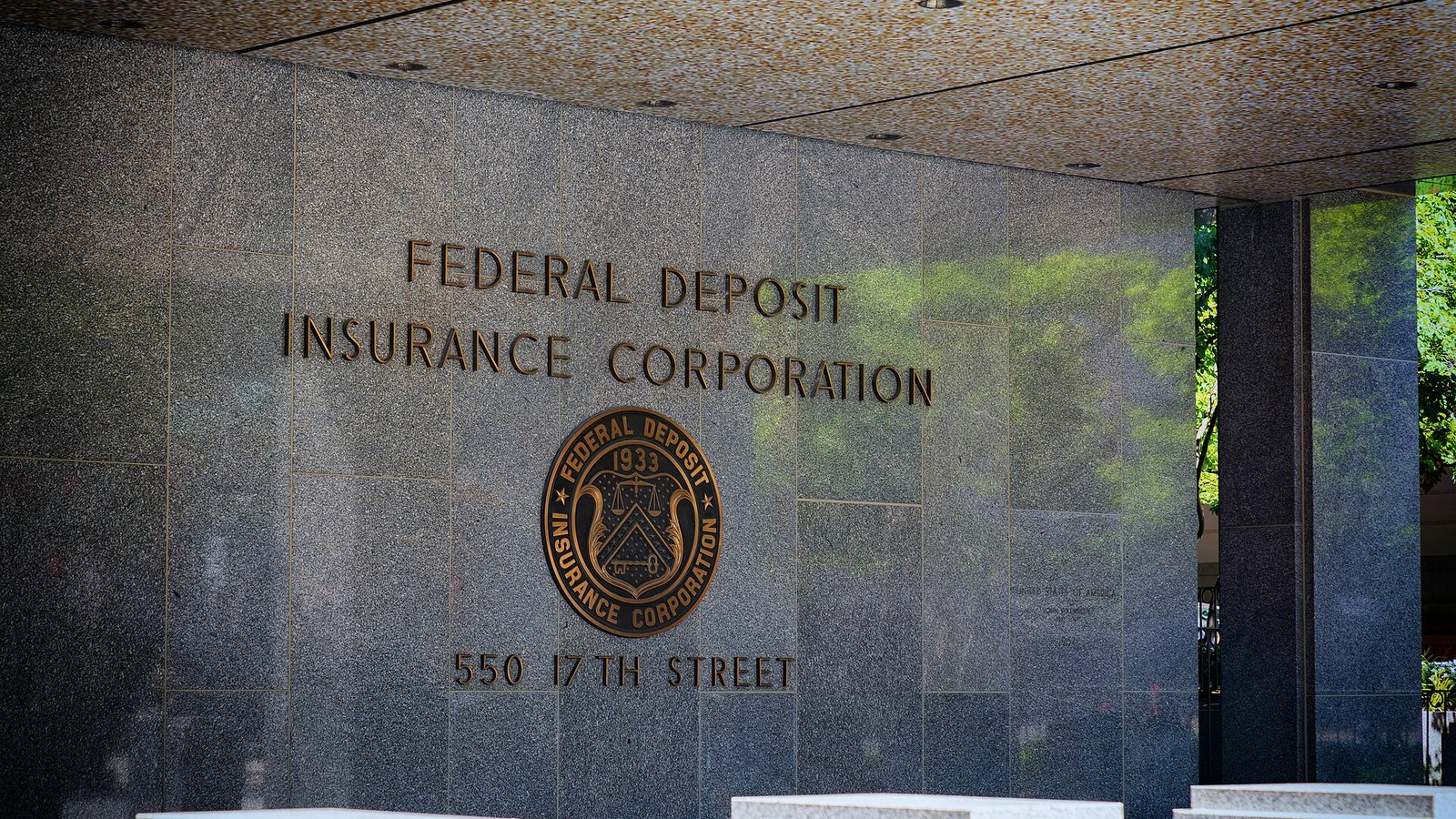 The Federal Deposit Insurance Corporation name and seal on its Washington headquarters.