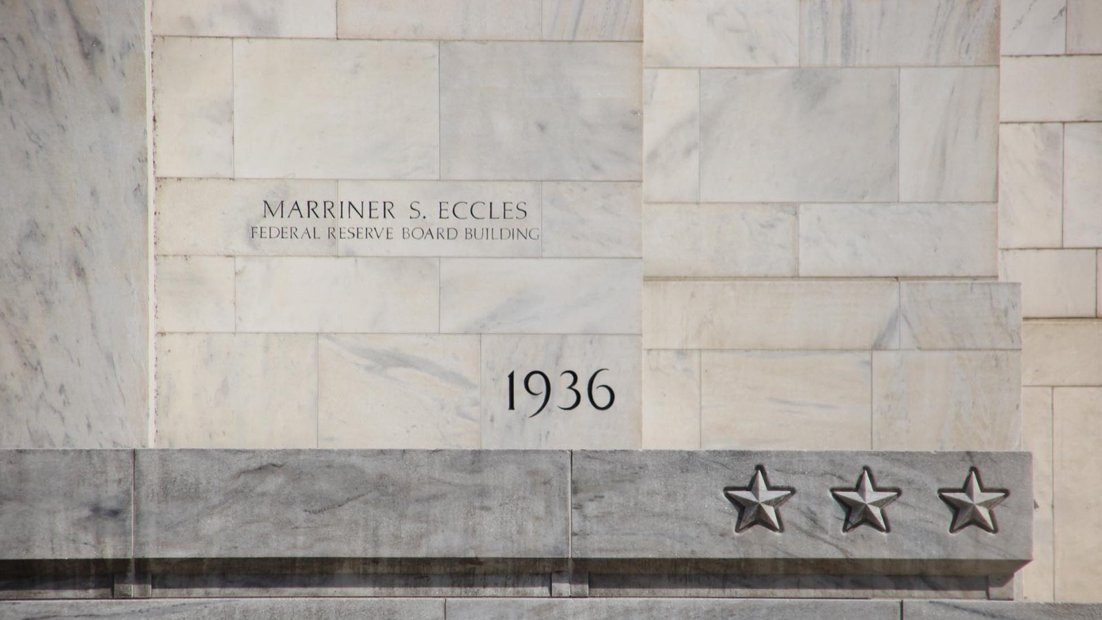 The name and 1936 cornerstone date of the Marriner S. Eccles Federal Reserve Board Building in Washington.