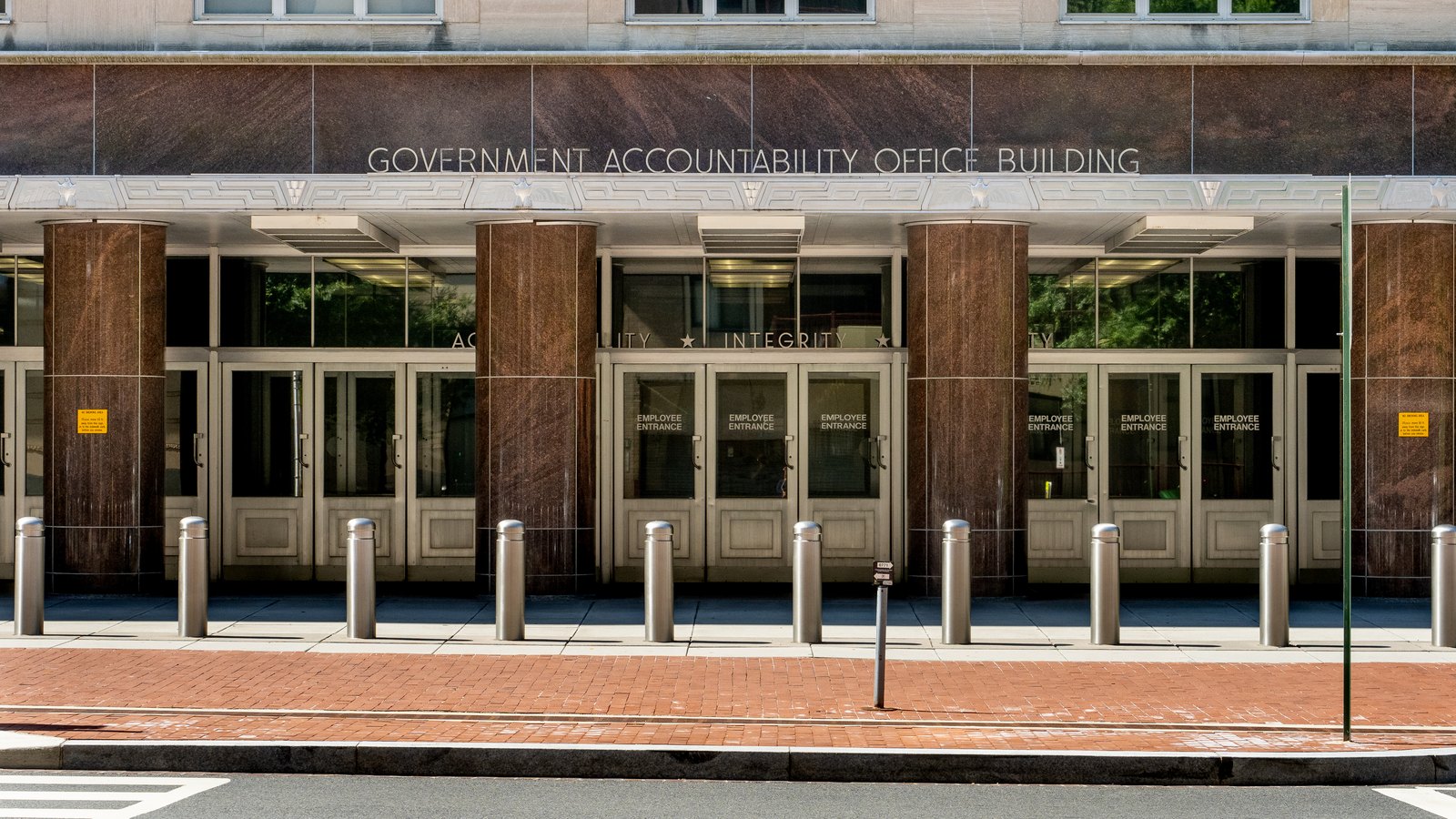 The entrance of the Government Accountability Office Building in Washington, with the agency name above the doors.