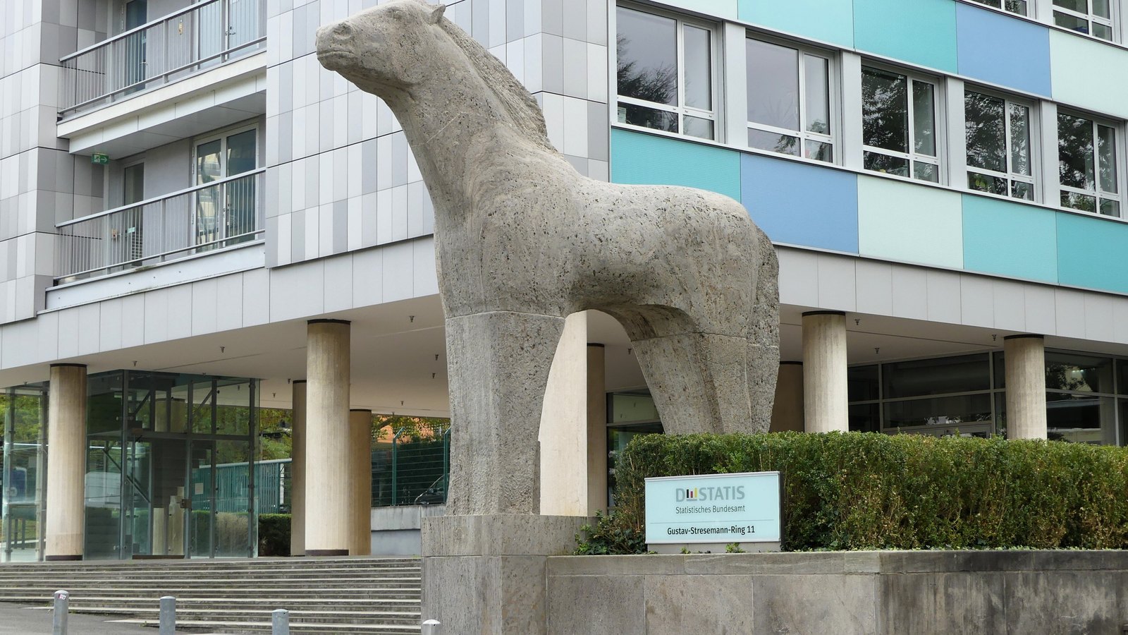 A stone horse stands outside the German Federal Statistical Office headquarters in Wiesbaden.