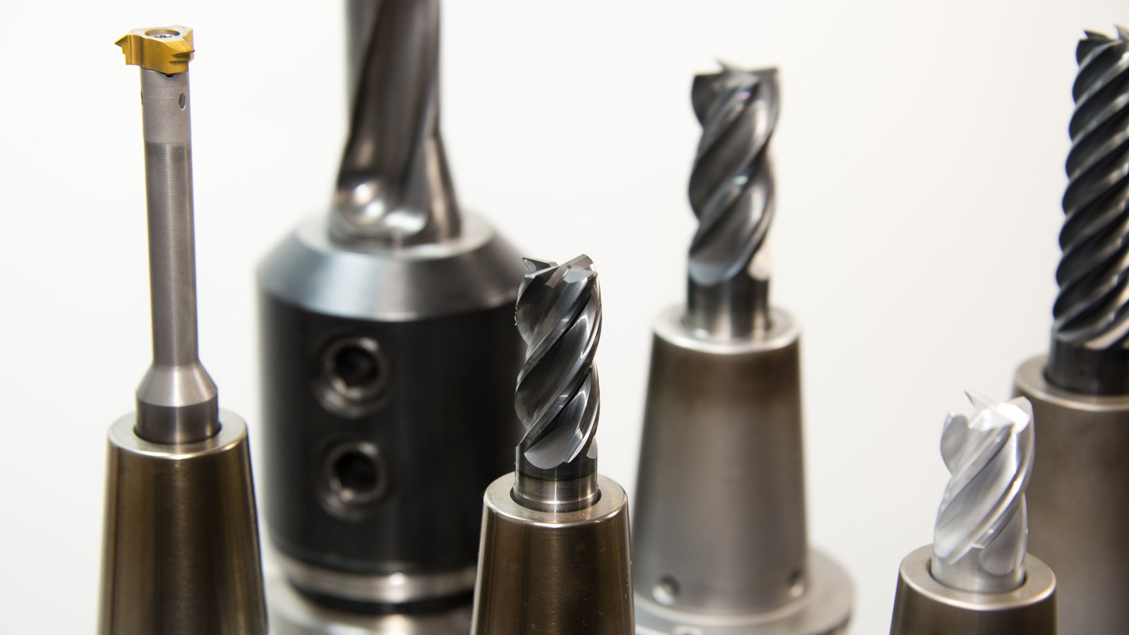 A photograph illustrating steel drill bits macro closeup.