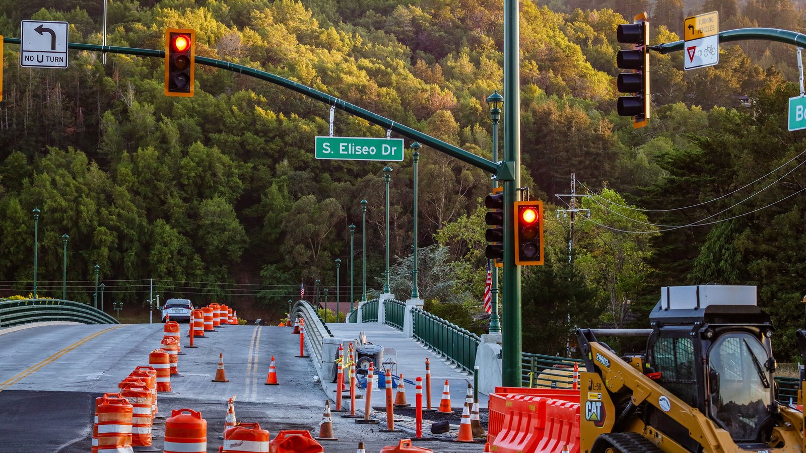 A road closure with barricades and signs.