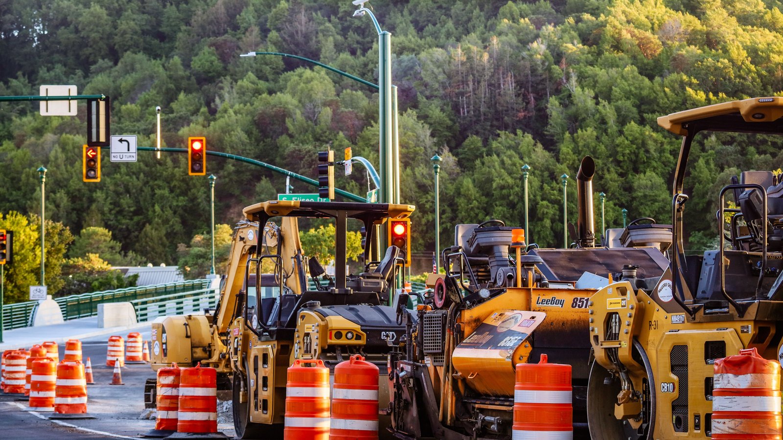A road closure with barricades and signs.