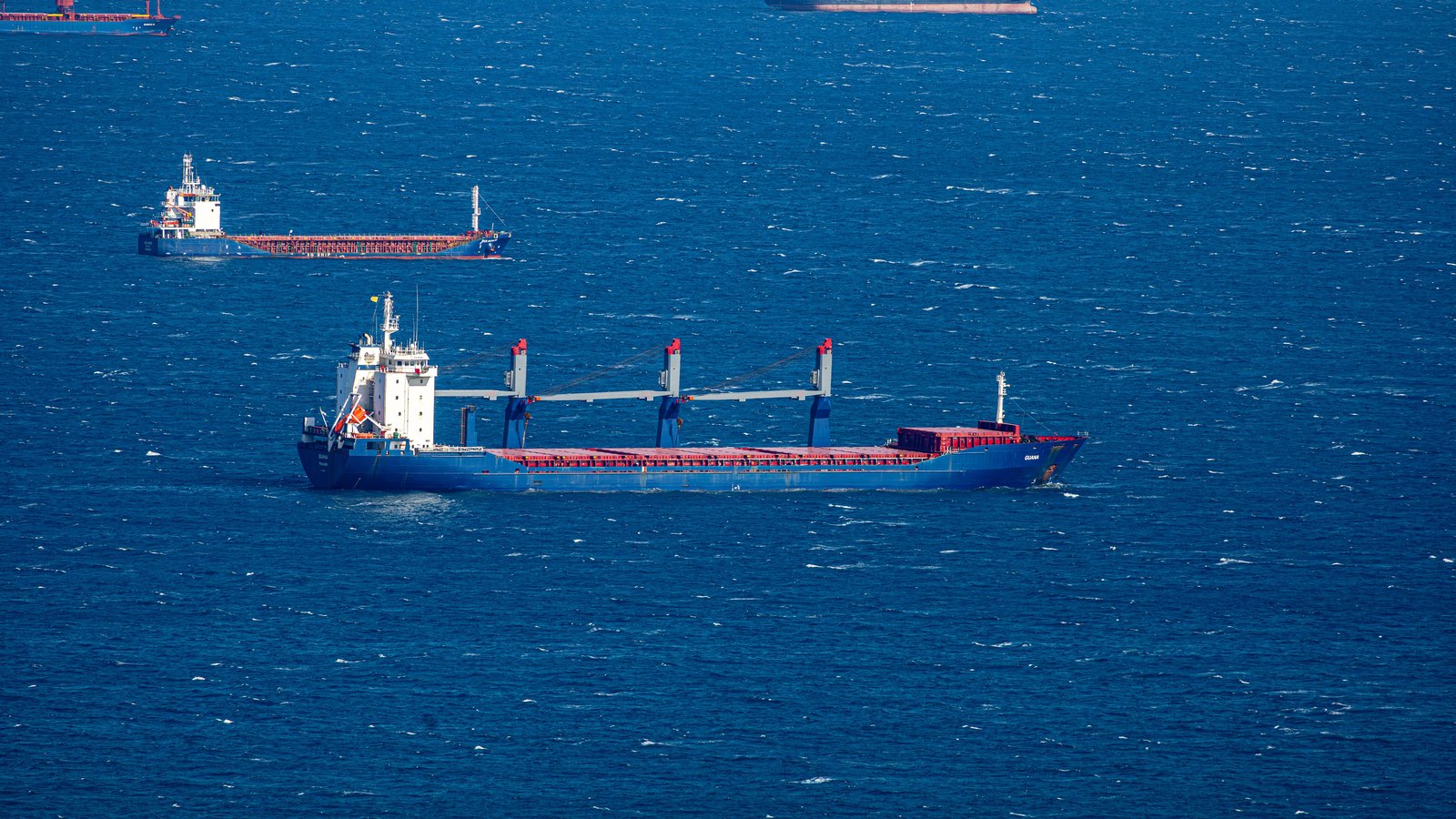 A photograph illustrating cargo ship ocean.
