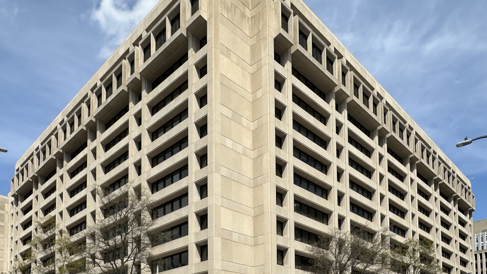 The concrete facade of the International Monetary Fund headquarters in Washington, D.C.