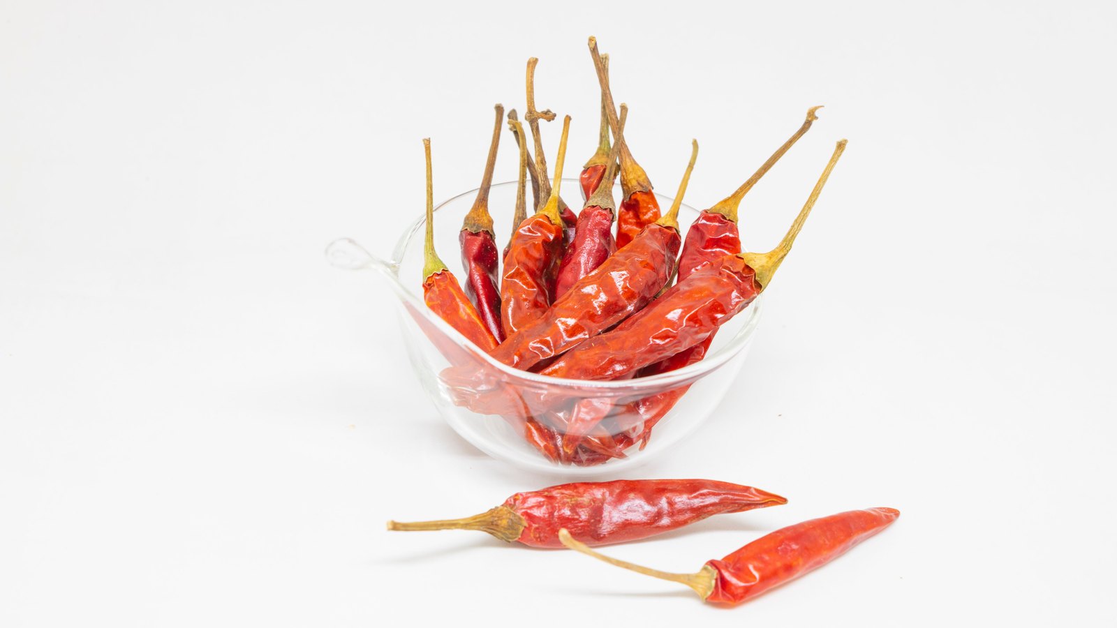 A photograph illustrating red chilli peppers.