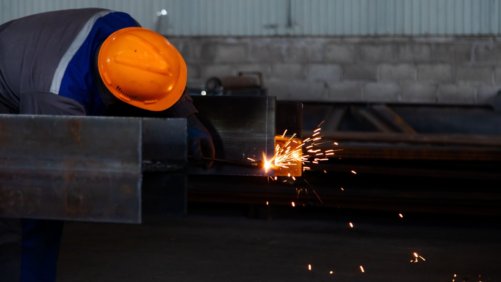 A photograph illustrating steel factory sparks.