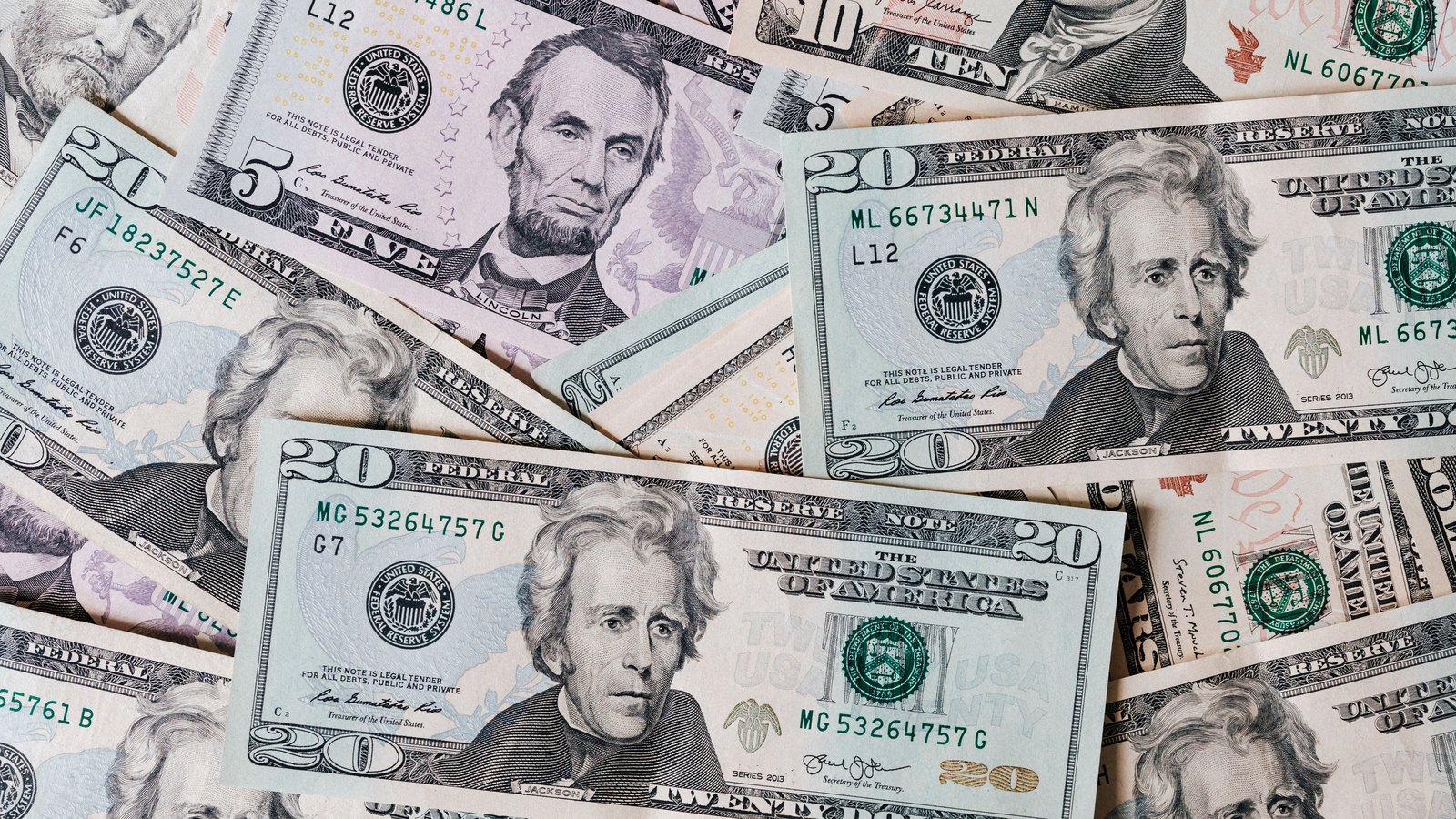 United States dollar banknotes in several denominations.