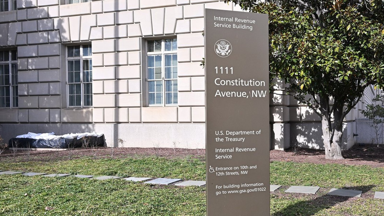 A sign identifies the Treasury Department and Internal Revenue Service at the IRS building in Washington.