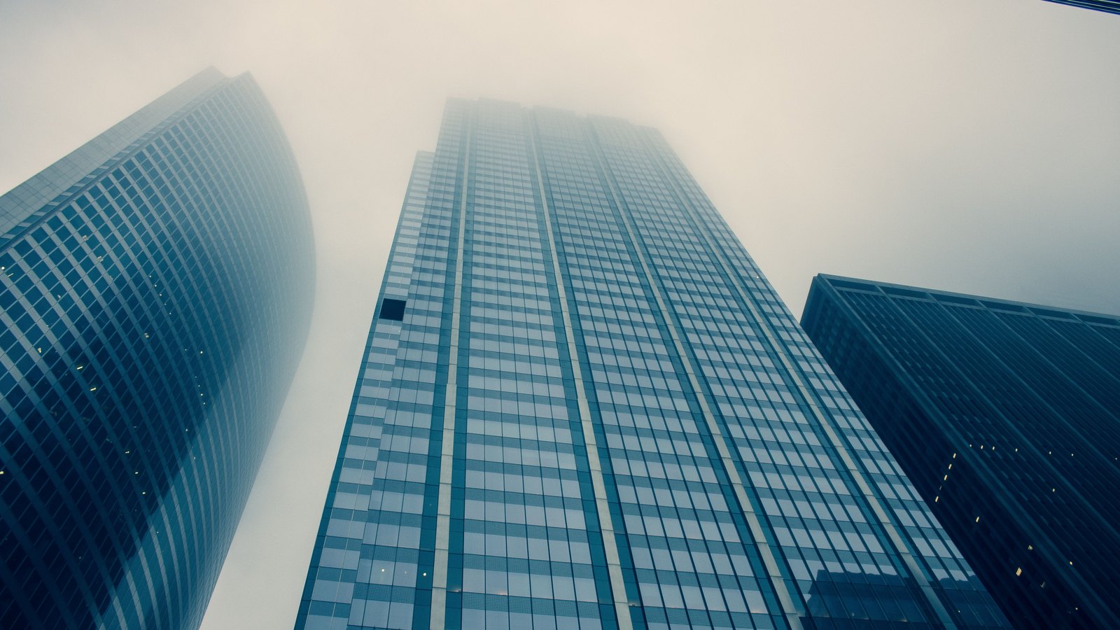A corporate office tower in a financial district.