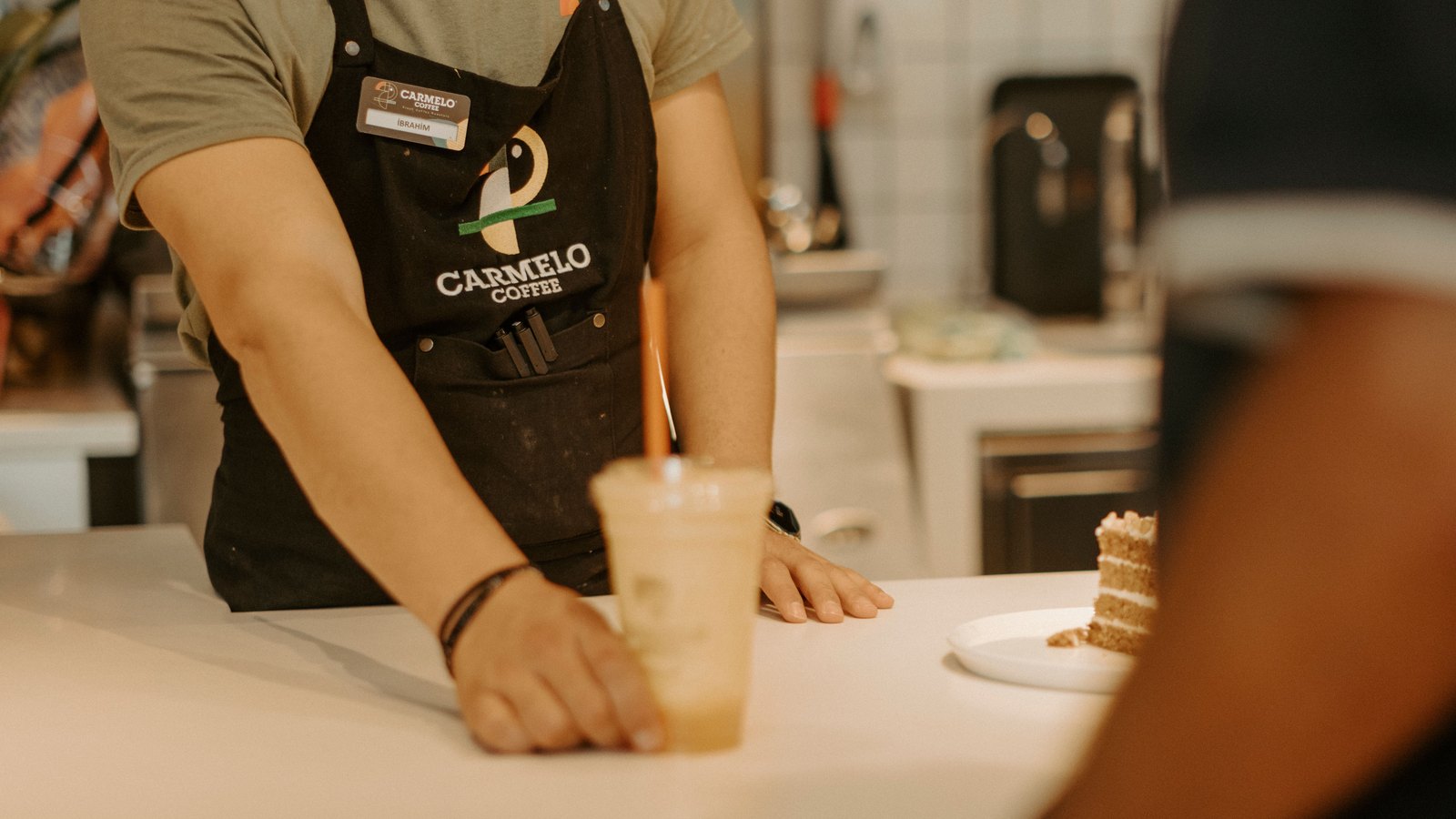 A photograph illustrating cafe counter service.