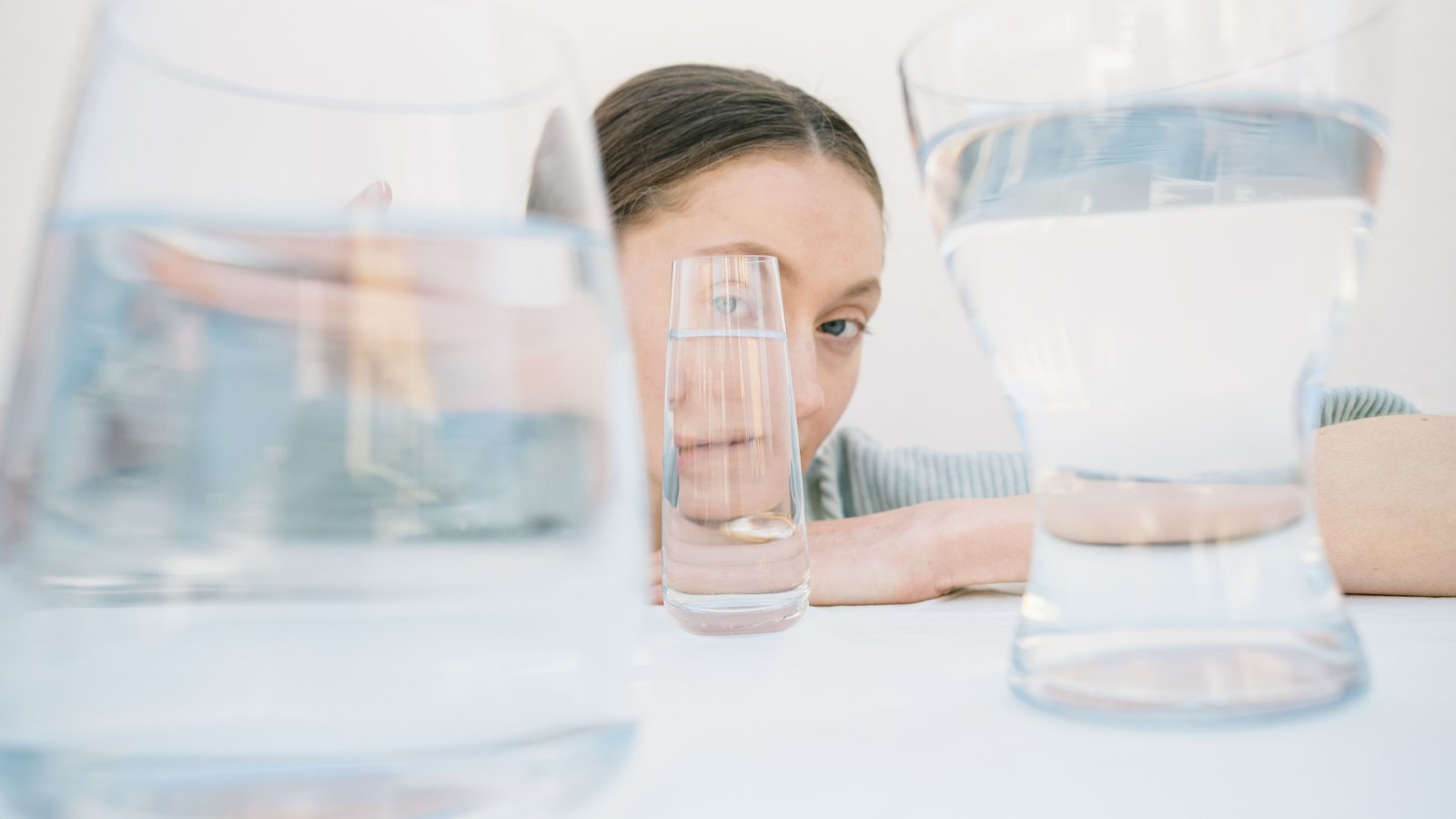 Clear drinking water in glasses on a table.