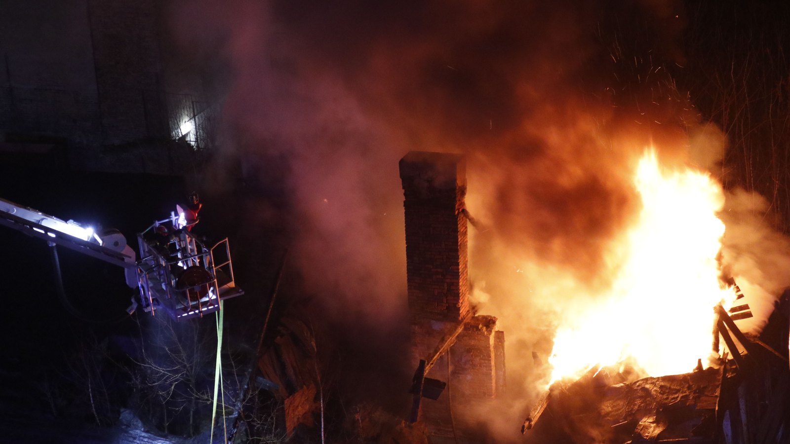 A fire and rescue truck responding at night.