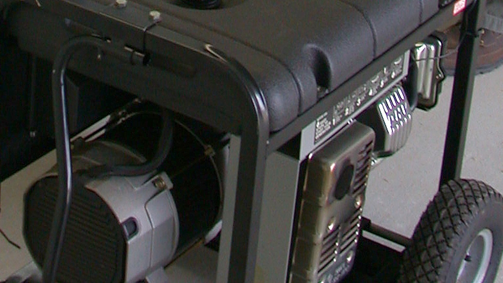 A close view of a portable gasoline generator during a federal safety test, not a photograph of this event.