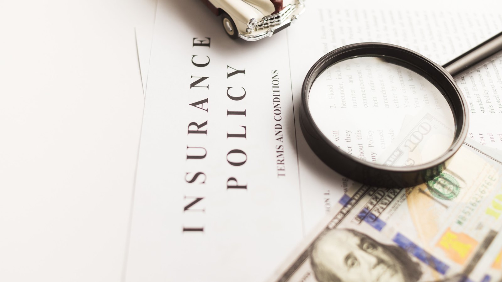 A photograph illustrating insurance policy documents.
