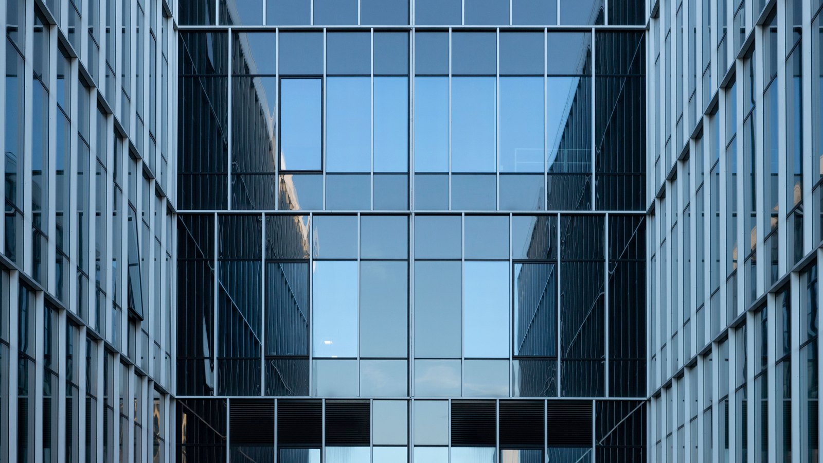 A photograph illustrating office building glass.