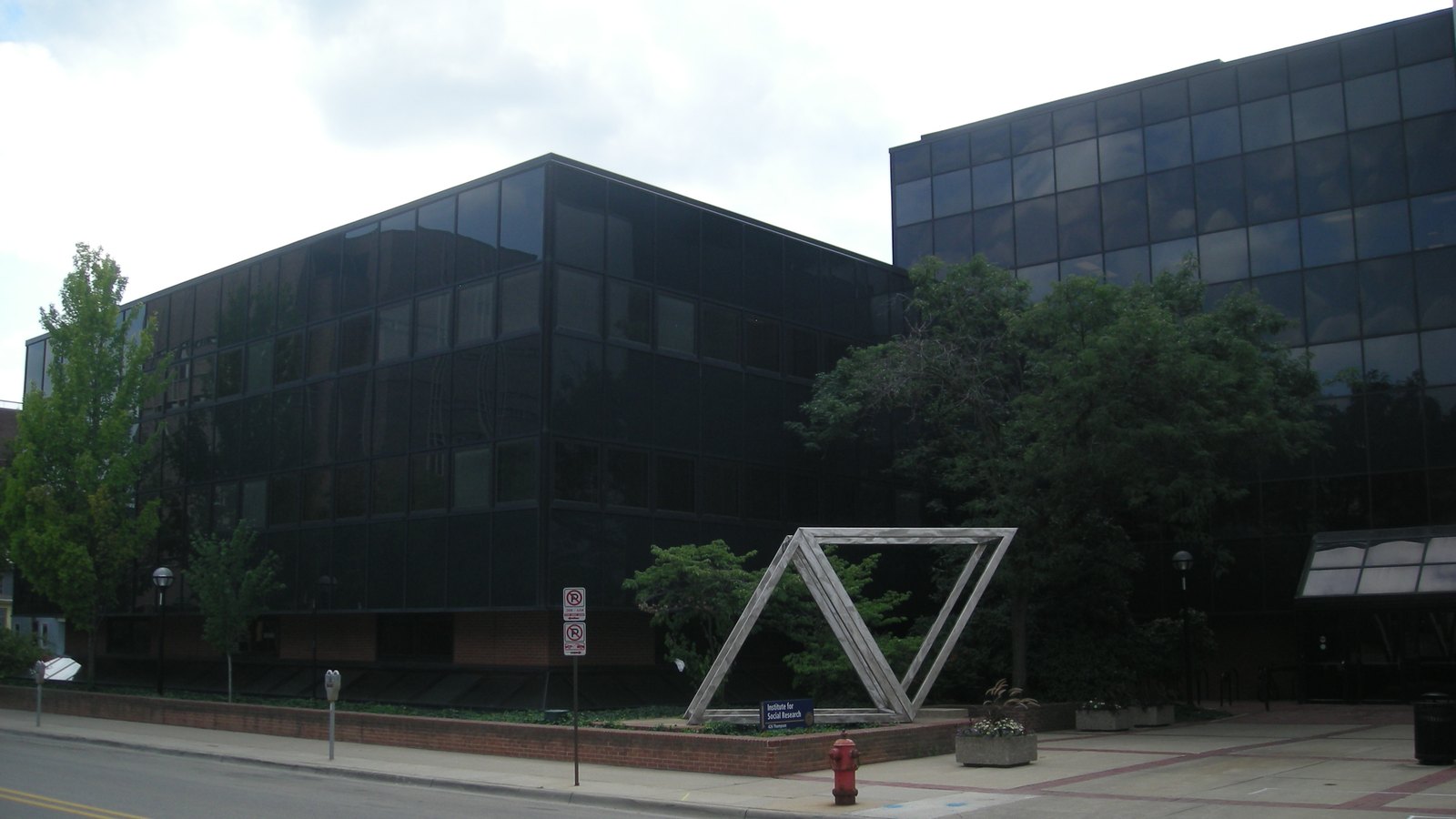 The dark glass Institute for Social Research buildings at the University of Michigan in Ann Arbor.