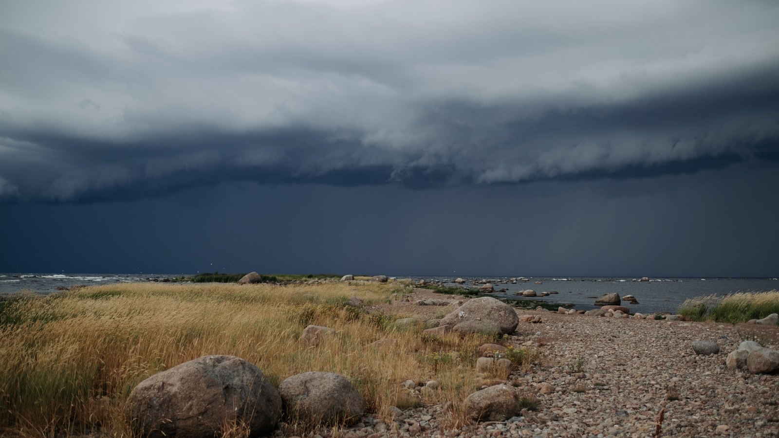 Storm clouds gathering over the coast.