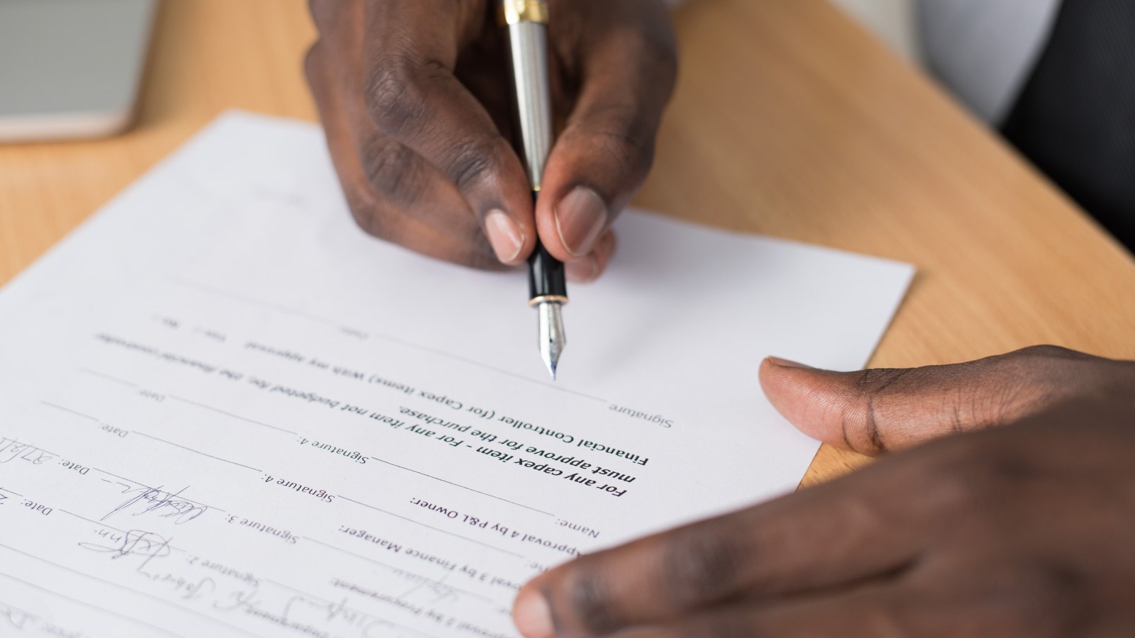 A photograph illustrating fountain pen on document macro.