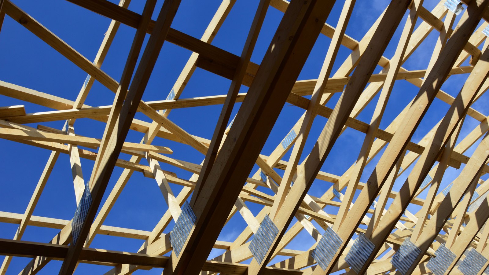 A photograph illustrating wood roof trusses.