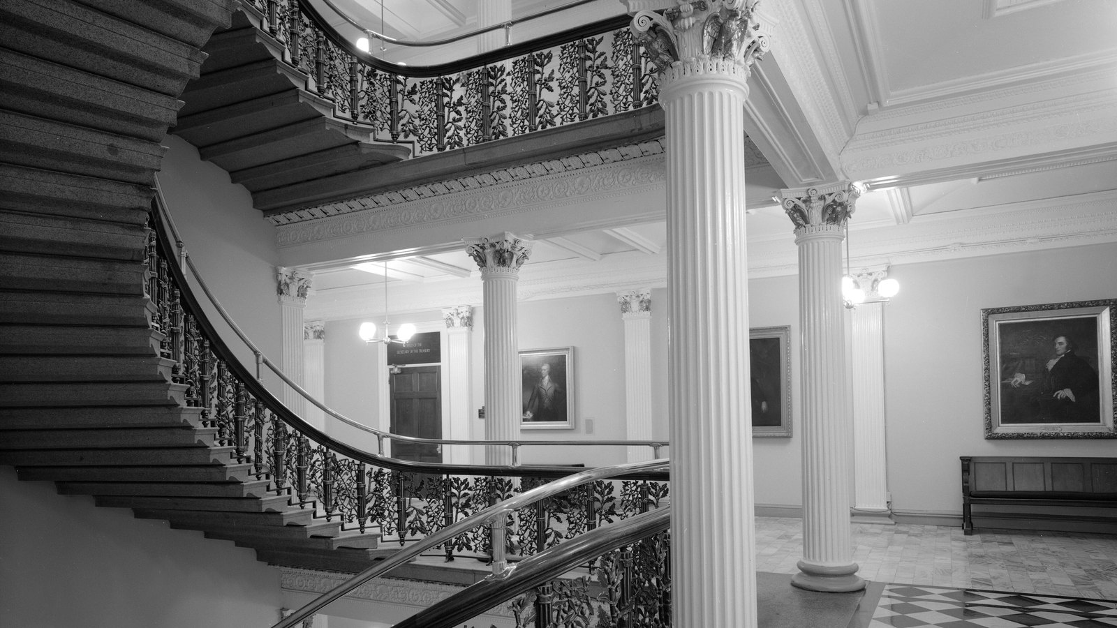 A hallway and staircase inside the United States Treasury Building.