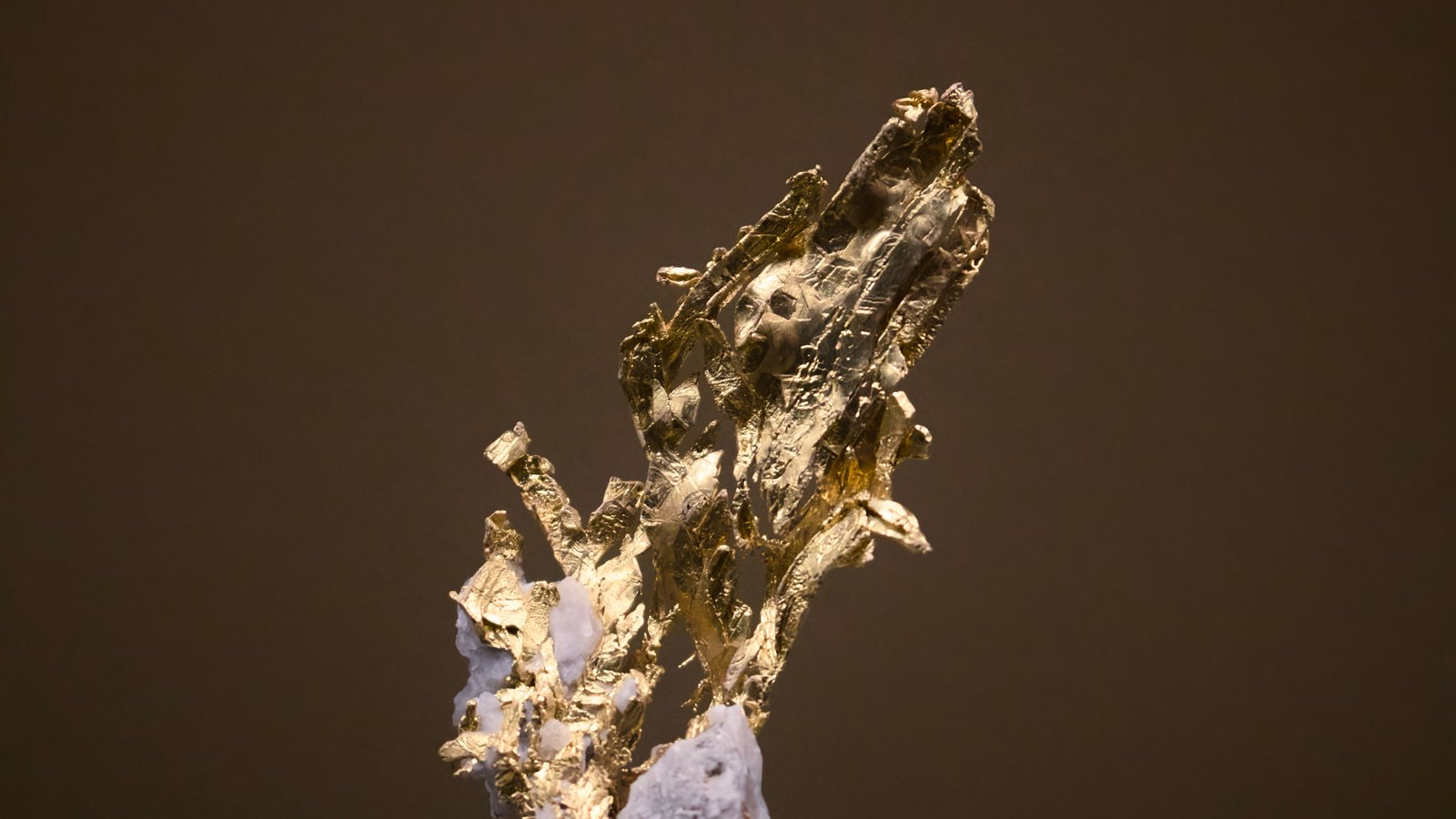 A photograph illustrating gold ore rock closeup.