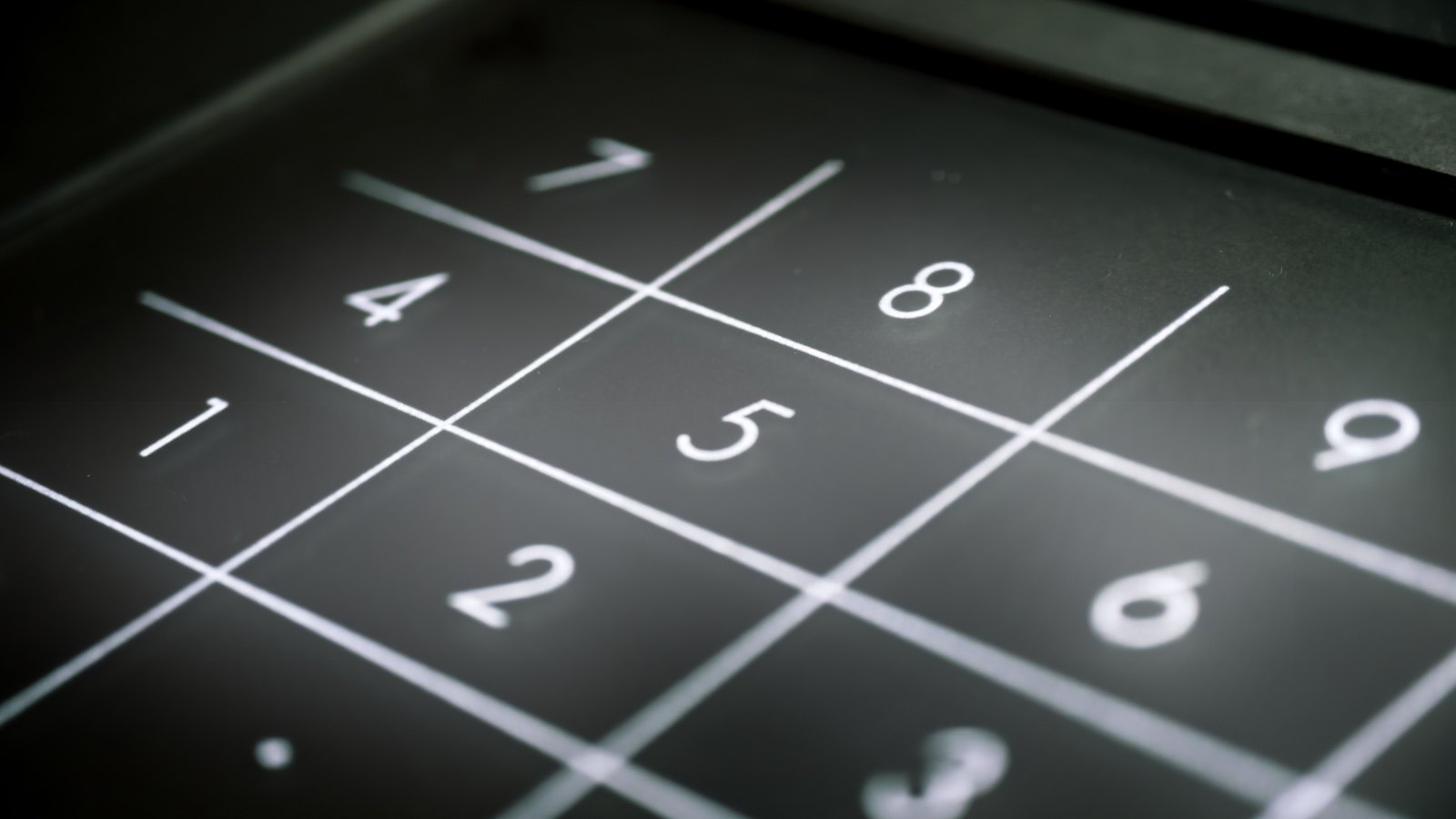 Close-up of a black numerical keypad.