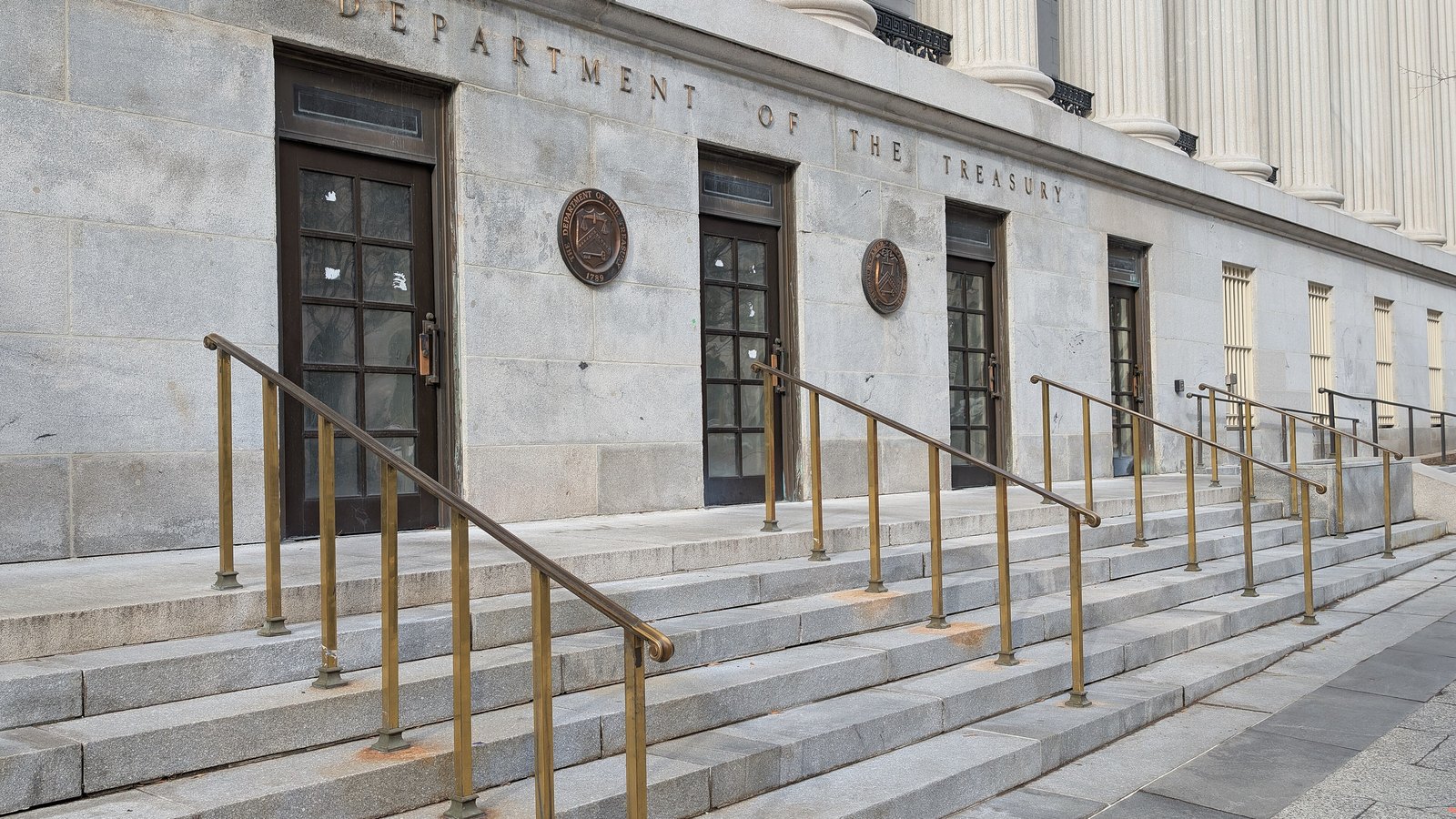 The stone entrance of the United States Department of the Treasury building in Washington.