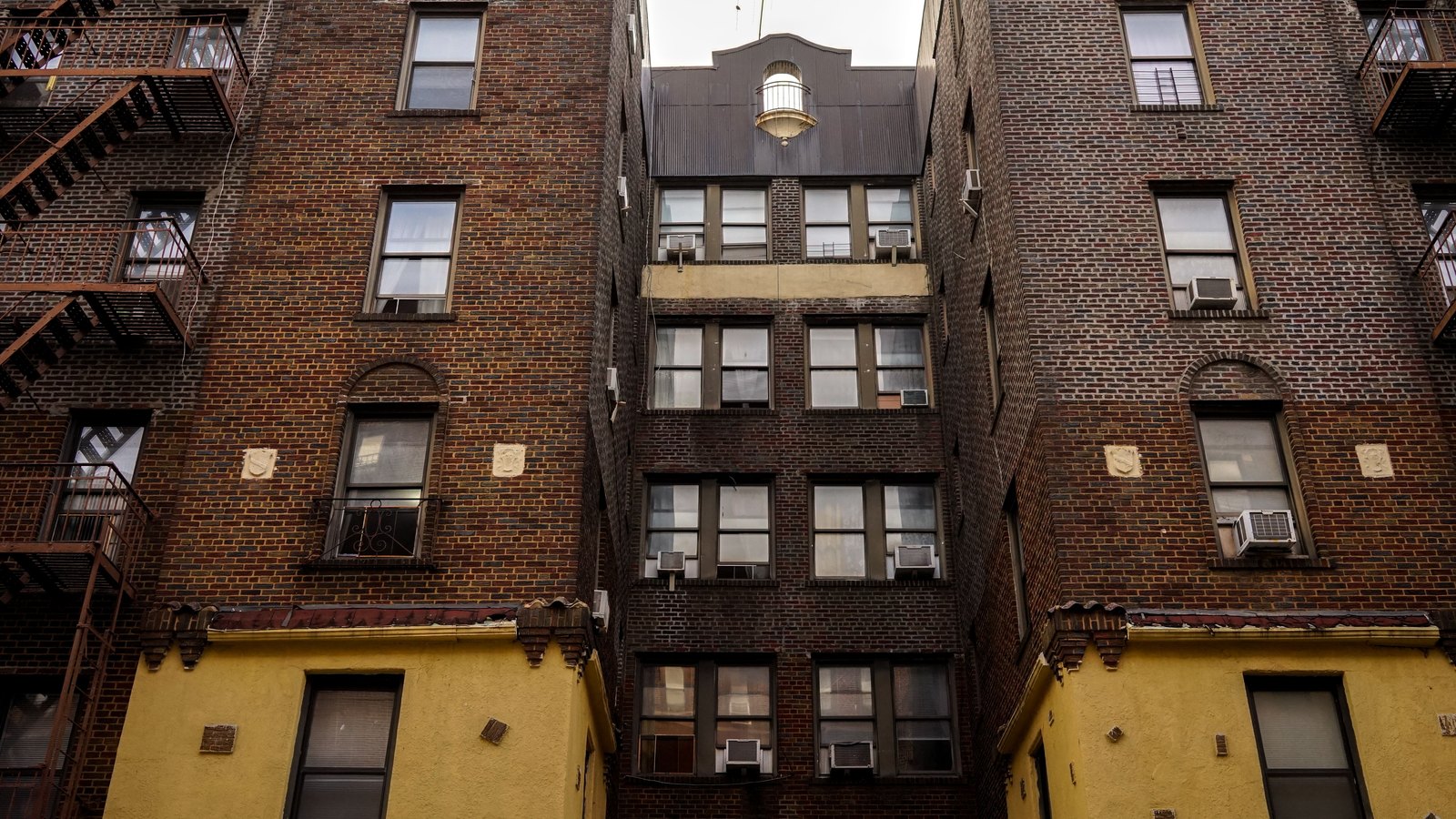 A photograph illustrating new york apartment buildings.