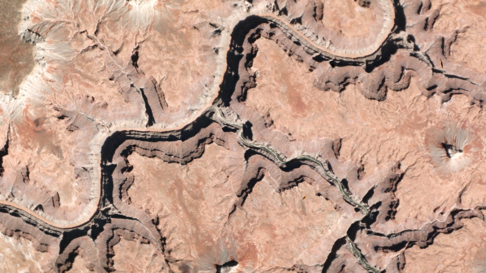 A Planet Labs satellite image showing the Colorado River winding through the Grand Canyon in Arizona.