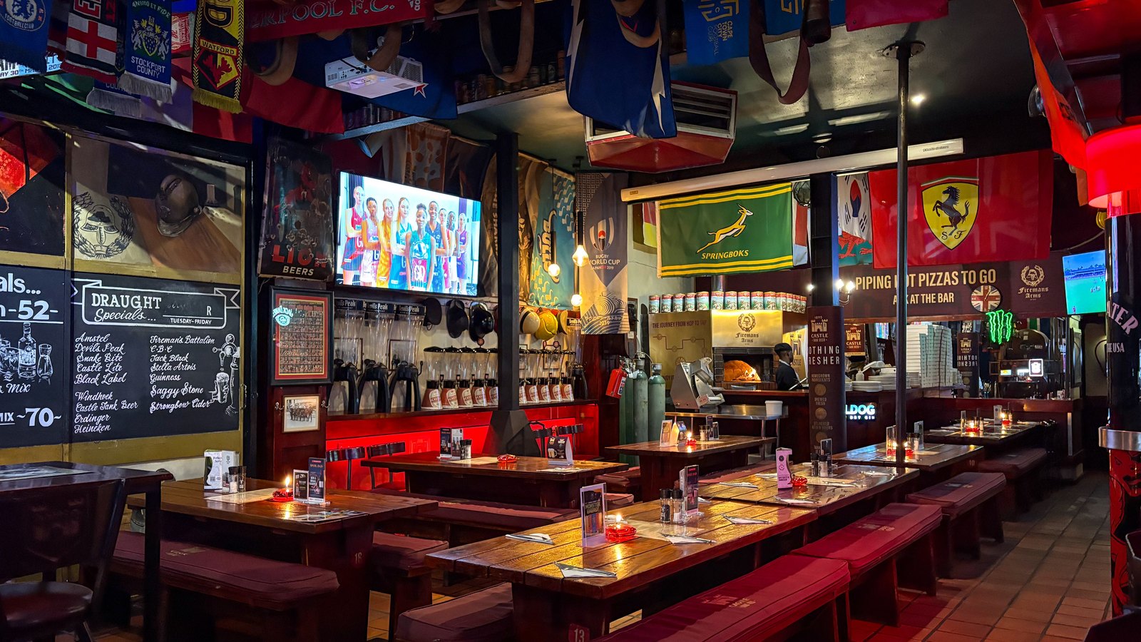 A photograph illustrating sports bar television.