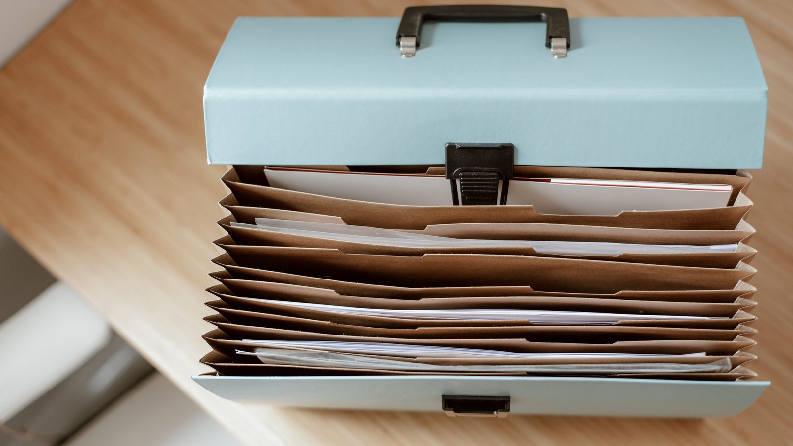 A photograph illustrating estate paperwork folder.