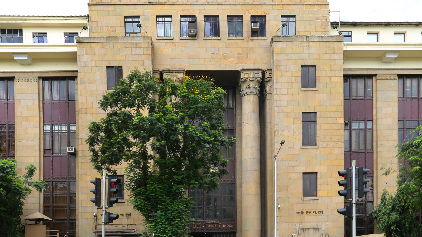 The Reserve Bank of India headquarters in Mumbai, with the bank's name above the central entrance.